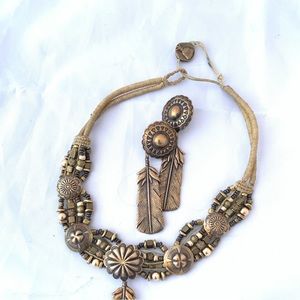 Mummy’s Bundle brass necklace and earrings by Mary and Doug Hancock